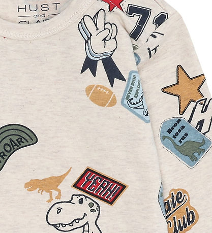 Hust and Claire Body l/æ - Buster Badges - Wheat Melange Hust and Claire Body l/æ - Buster Badges - Wheat Melange