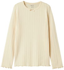 Name It Bluse - Rib - NkfNolea - Parchment m. Hulmønster Name It Bluse - Rib - NkfNolea - Parchment m. Hulmønster