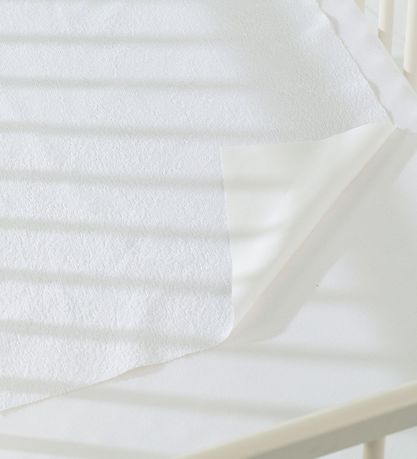 Tapis en éponge BabyDan - 60x120 cm - Imperméable - Blanc Tapis en éponge BabyDan - 60x120 cm - Imperméable - Blanc