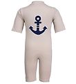 Petit Crabe Badeheldragt - Noe - UV50+ - Latte Petit Crabe Badeheldragt - Noe - UV50+ - Latte