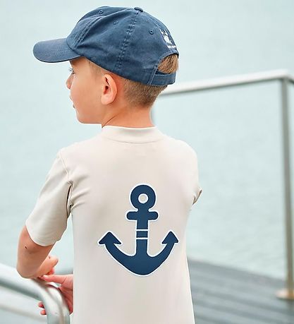 Petit Crabe Badeheldragt - Noe - UV50+ - Latte Petit Crabe Badeheldragt - Noe - UV50+ - Latte