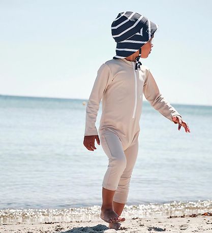 Petit Crabe Badeheldragt - Lou - UV50+ - Latte Petit Crabe Badeheldragt - Lou - UV50+ - Latte