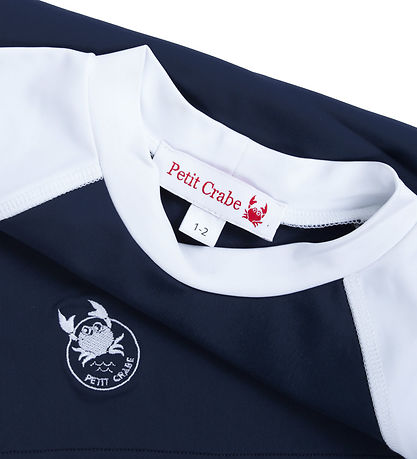 Petit Crabe Badebluse - Raglan - UV50+ - Blue/White Petit Crabe Badebluse - Raglan - UV50+ - Blue/White