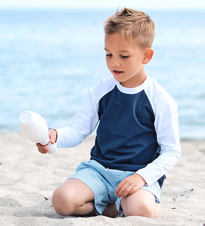 Petit Crabe Badebluse - Raglan - UV50+ - Blue/White Petit Crabe Badebluse - Raglan - UV50+ - Blue/White