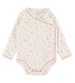 Fixoni Slå-om Body l/æ - Light Rose m. Blomster Fixoni Slå-om Body l/æ - Light Rose m. Blomster