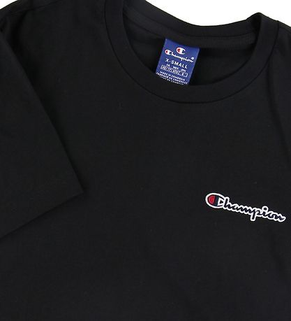 T-Shirt Champion Fashion - Noir av. Logo T-Shirt Champion Fashion - Noir av. Logo