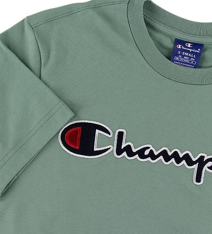 T-Shirt Champion Fashion - Vert Cendré av. Logo T-Shirt Champion Fashion - Vert Cendré av. Logo