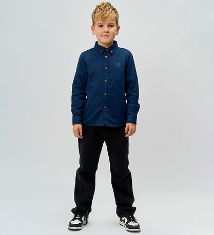 The New Jeans - Loos Fit - TnReturn - Black Denim The New Jeans - Loos Fit - TnReturn - Black Denim